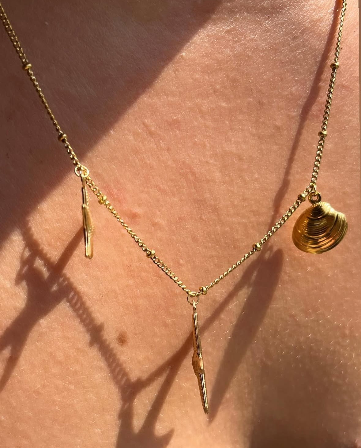 Collier brelqoue marin doré