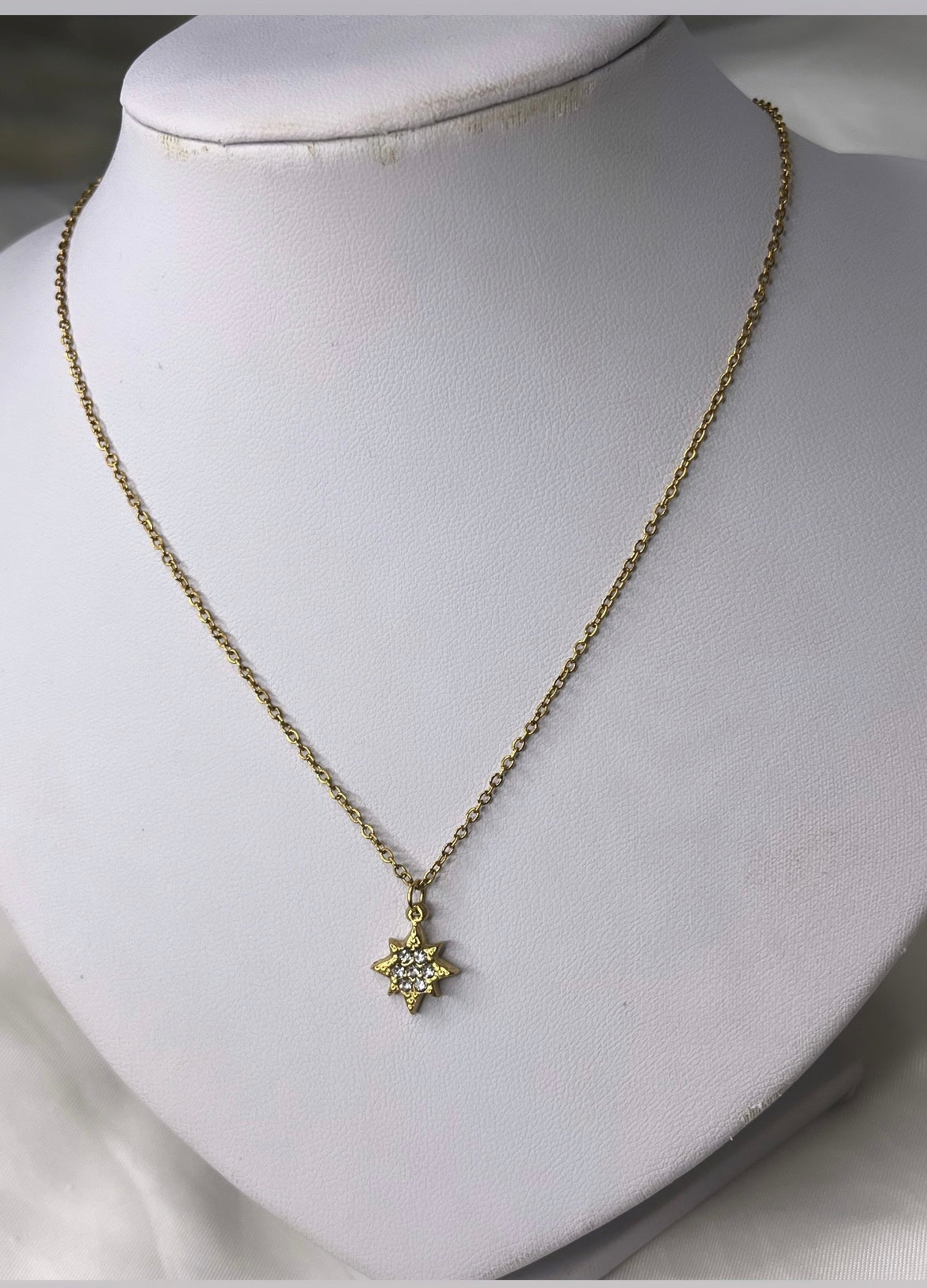 Collier étoile filante doré