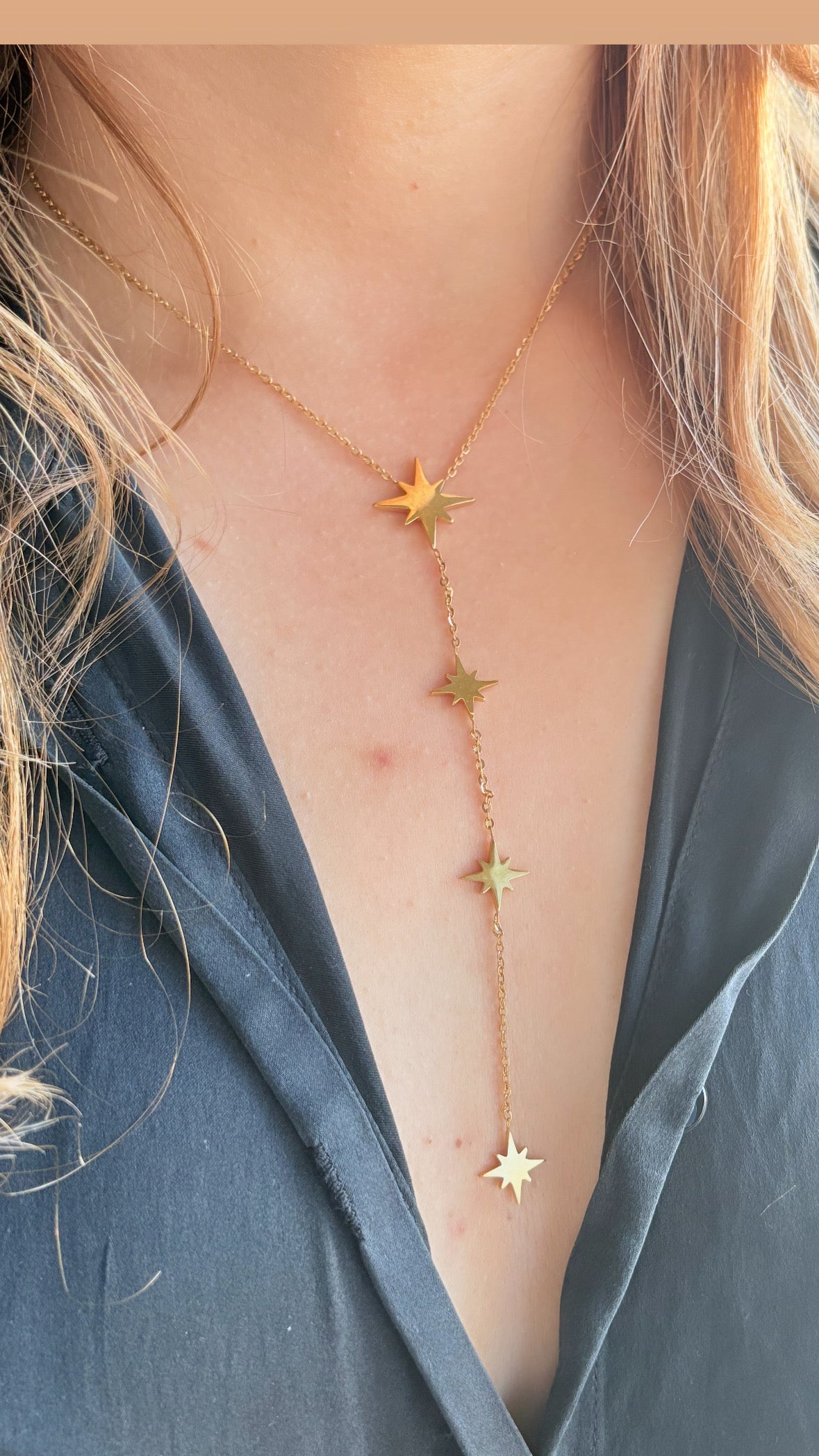 Collier étoile filante doré