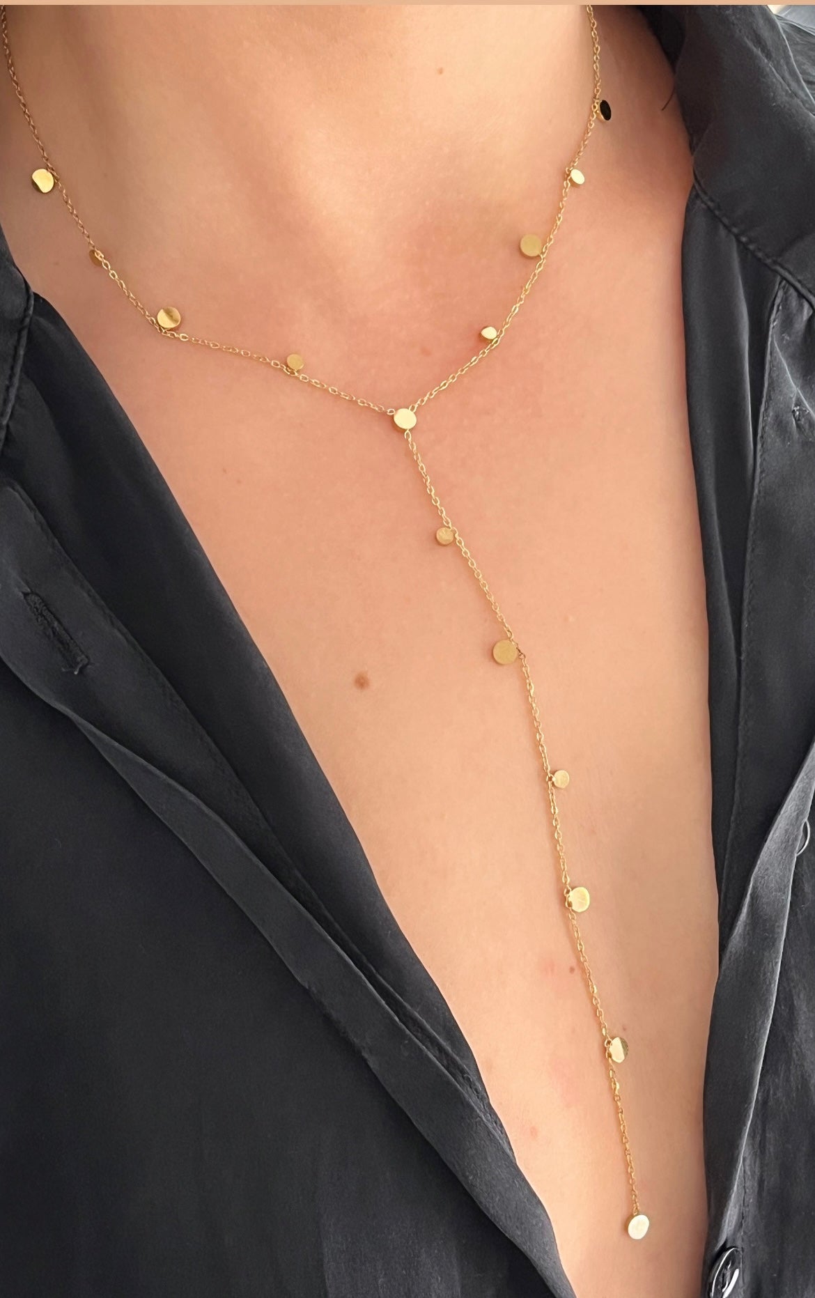 Collier sautoir motif rond doré