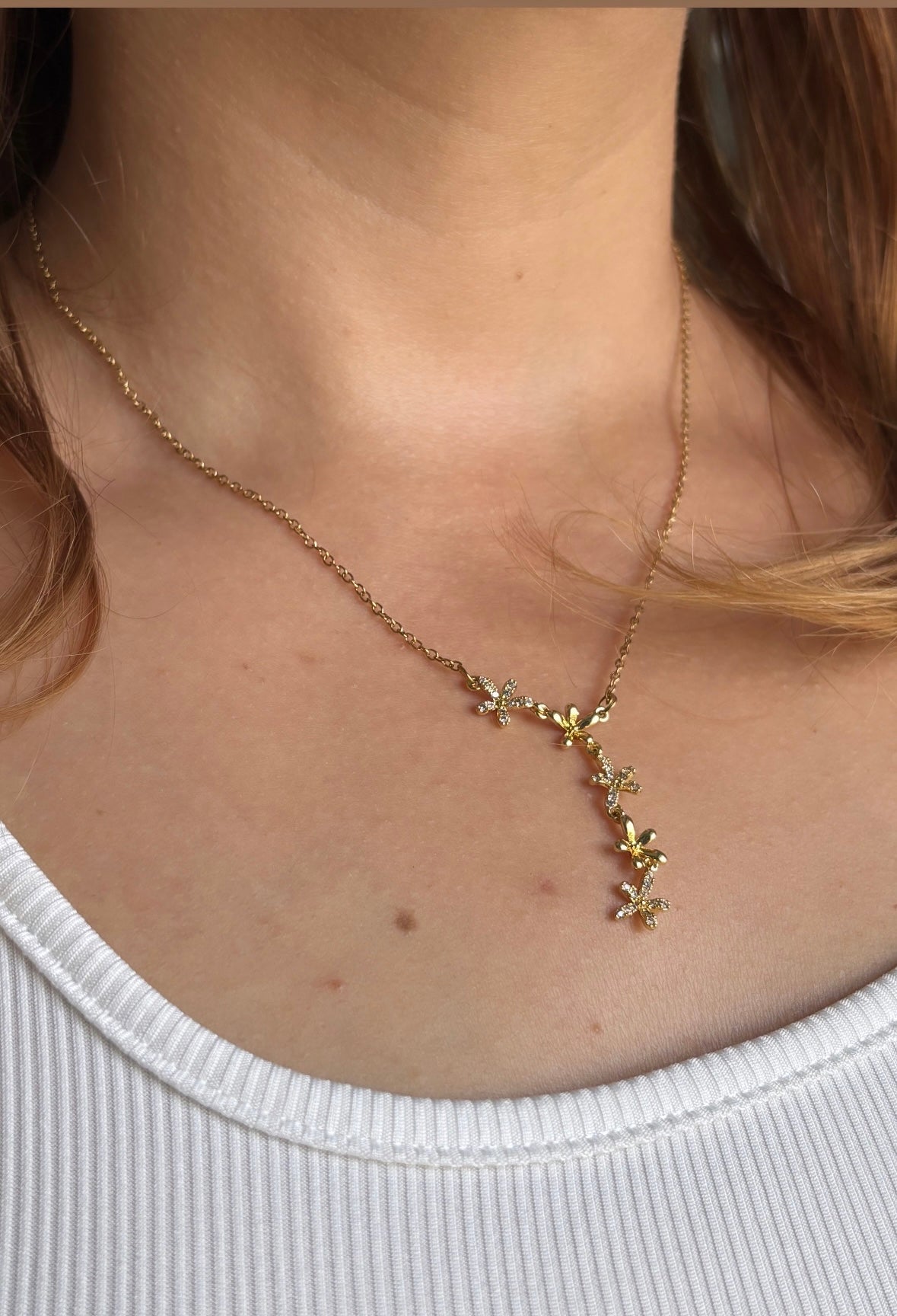 Collier étoile filante doré