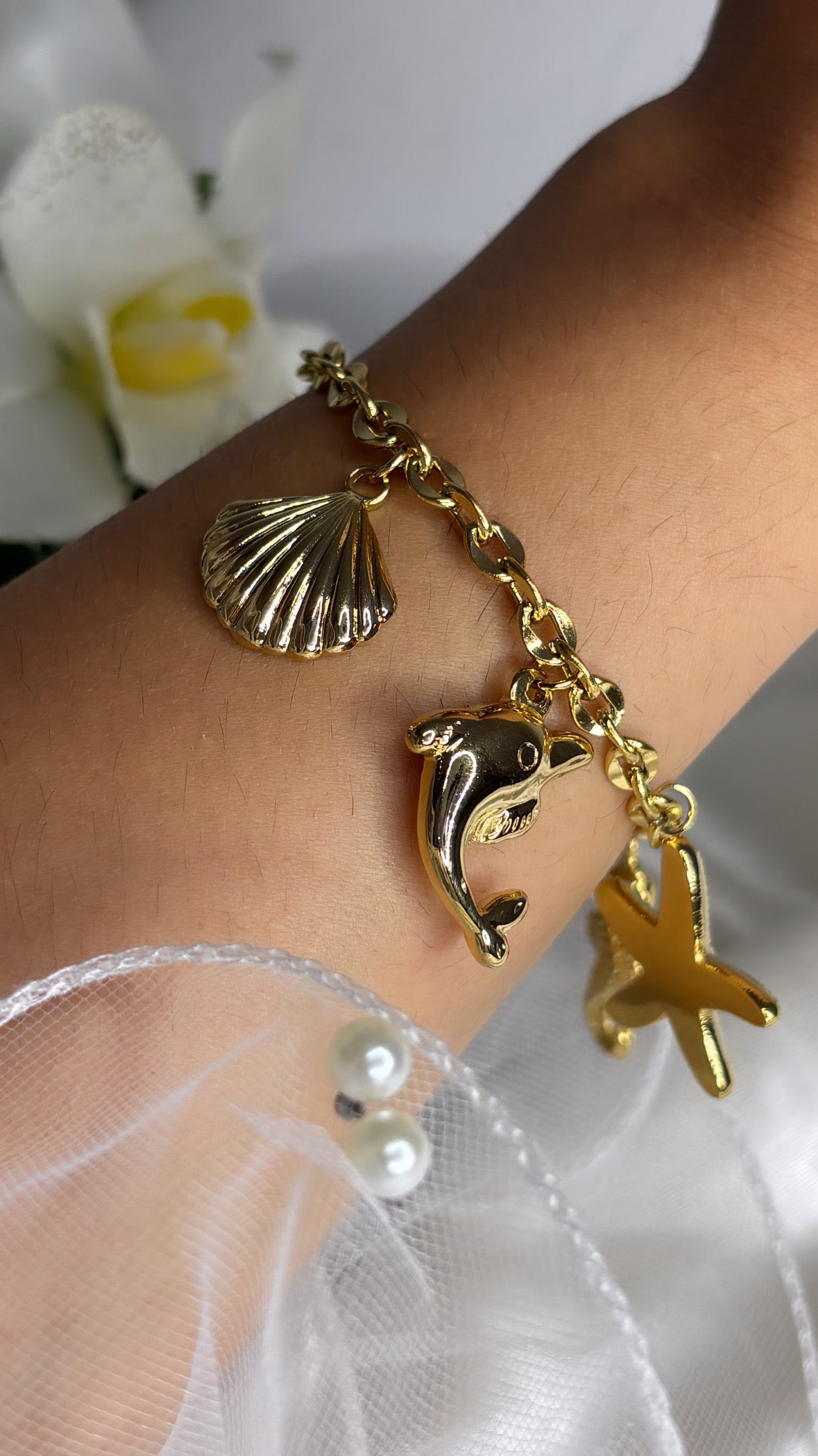 Bracelet breloque marin doré