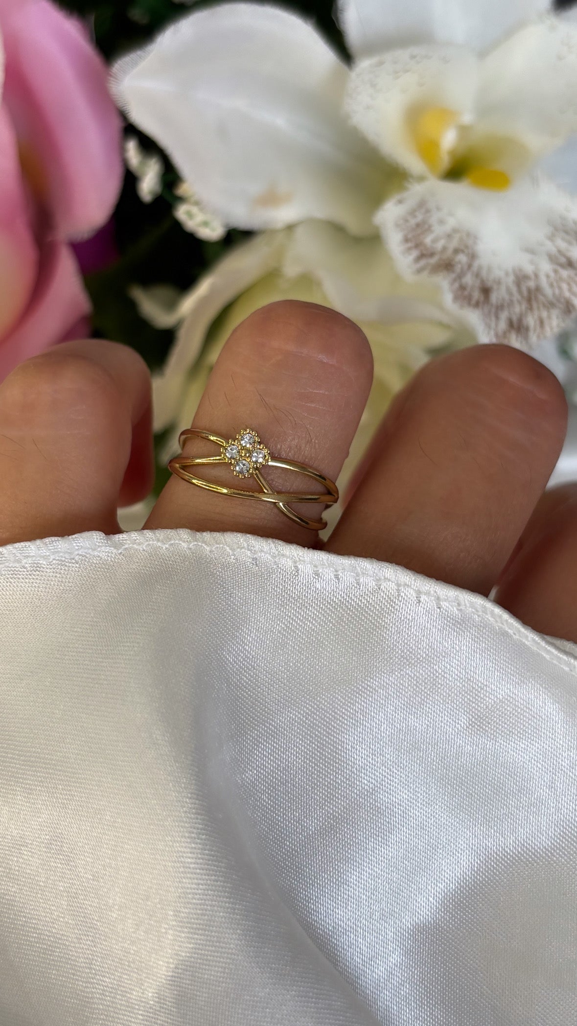 Bague à strass et trèfle