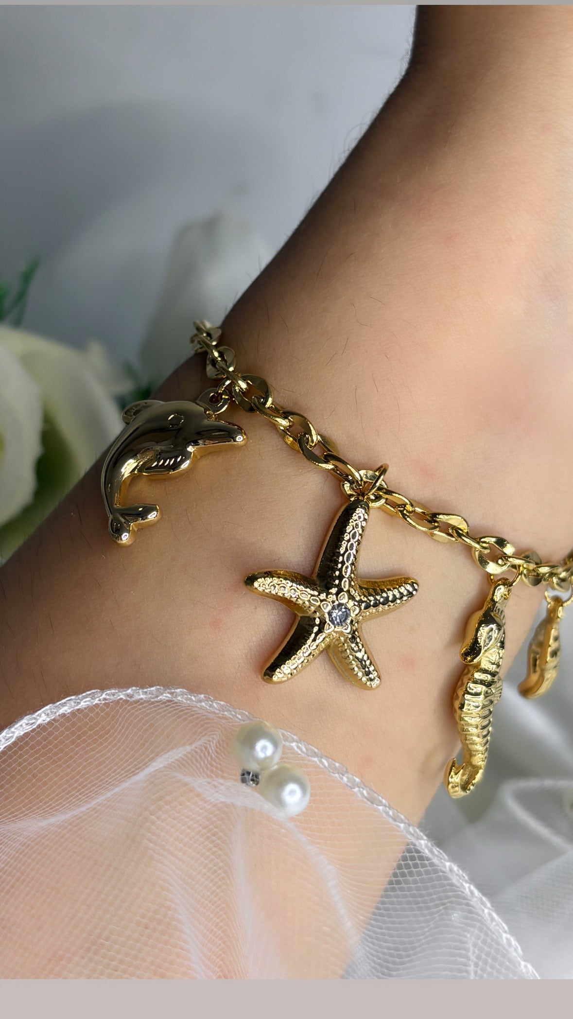 Bracelet breloque marin doré