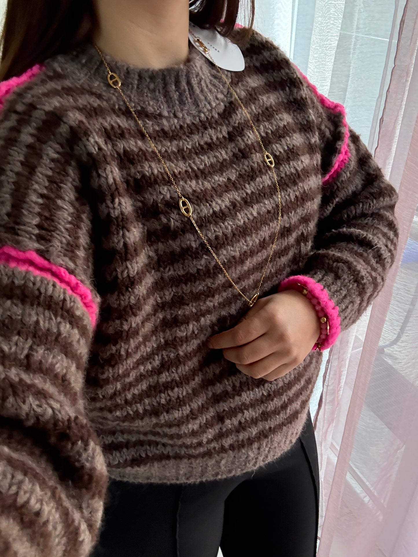 Pull surpiqûres choco fushia