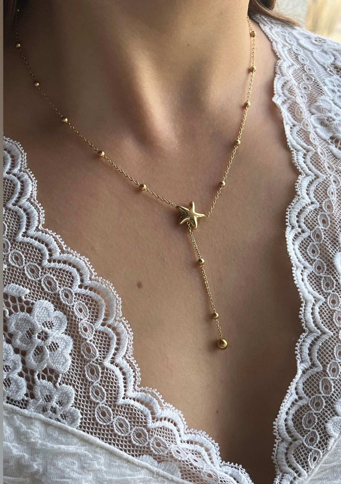 Collier sautoir doré étoile