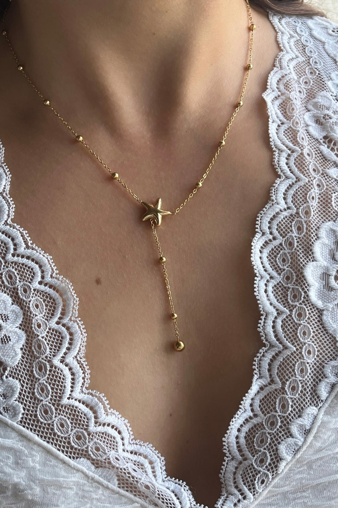 Collier sautoir doré étoile