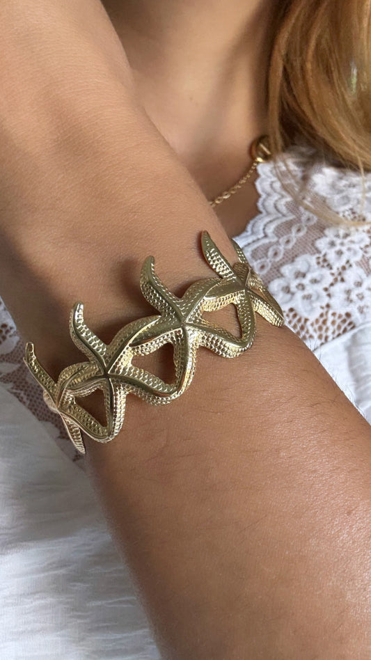 Bracelet jonc étoile de mer doré