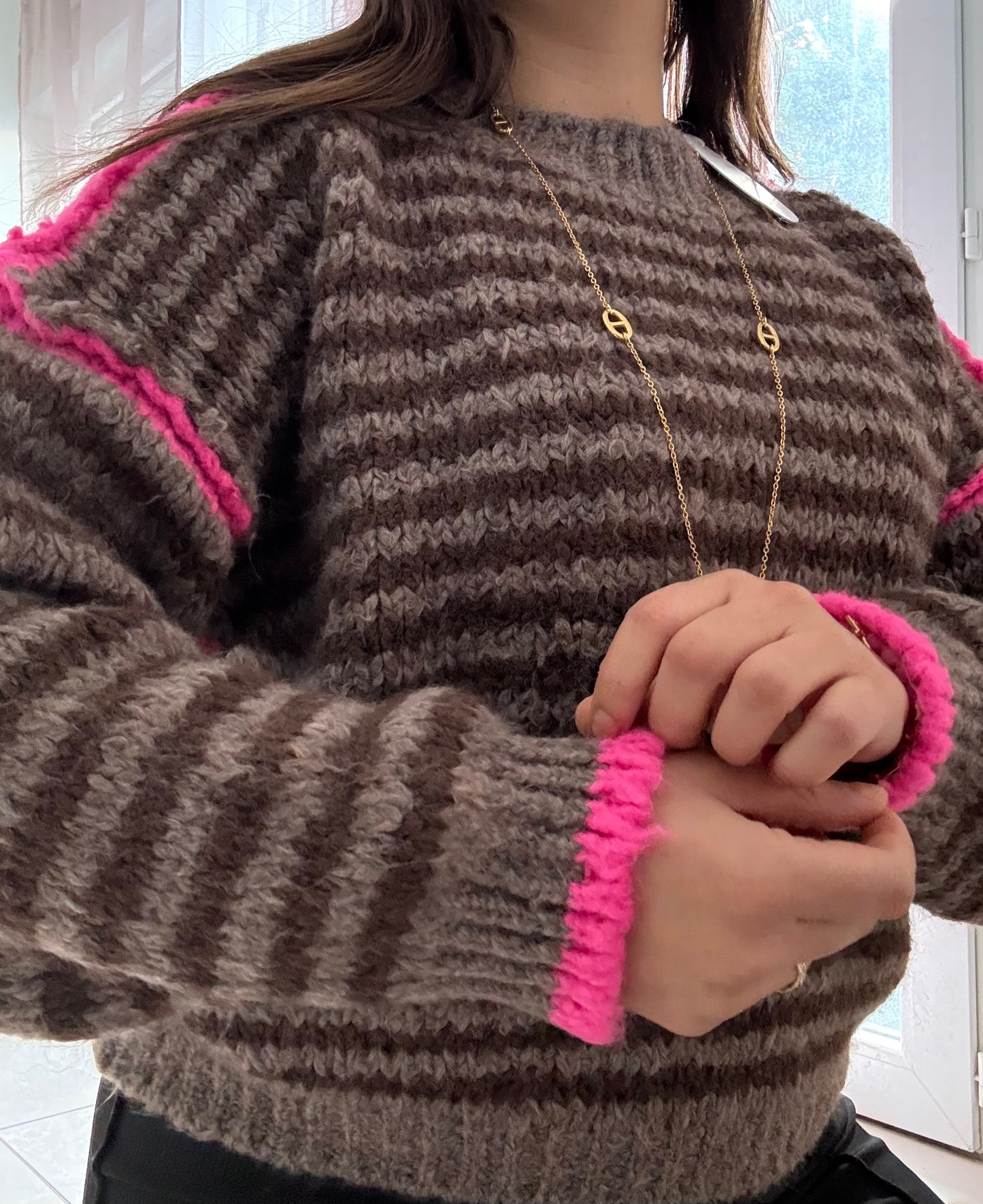 Pull surpiqûres choco fushia